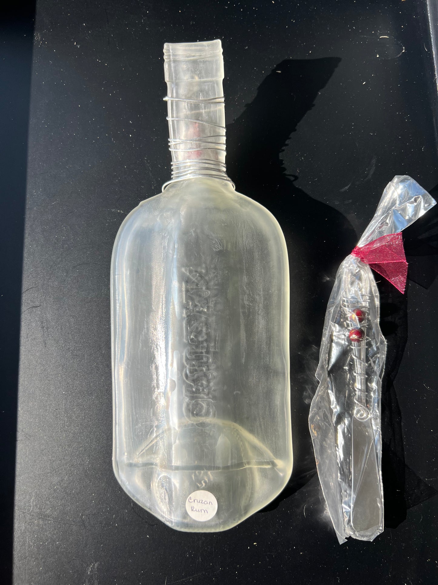 Cruzan Scooped Melted Bottle- Red